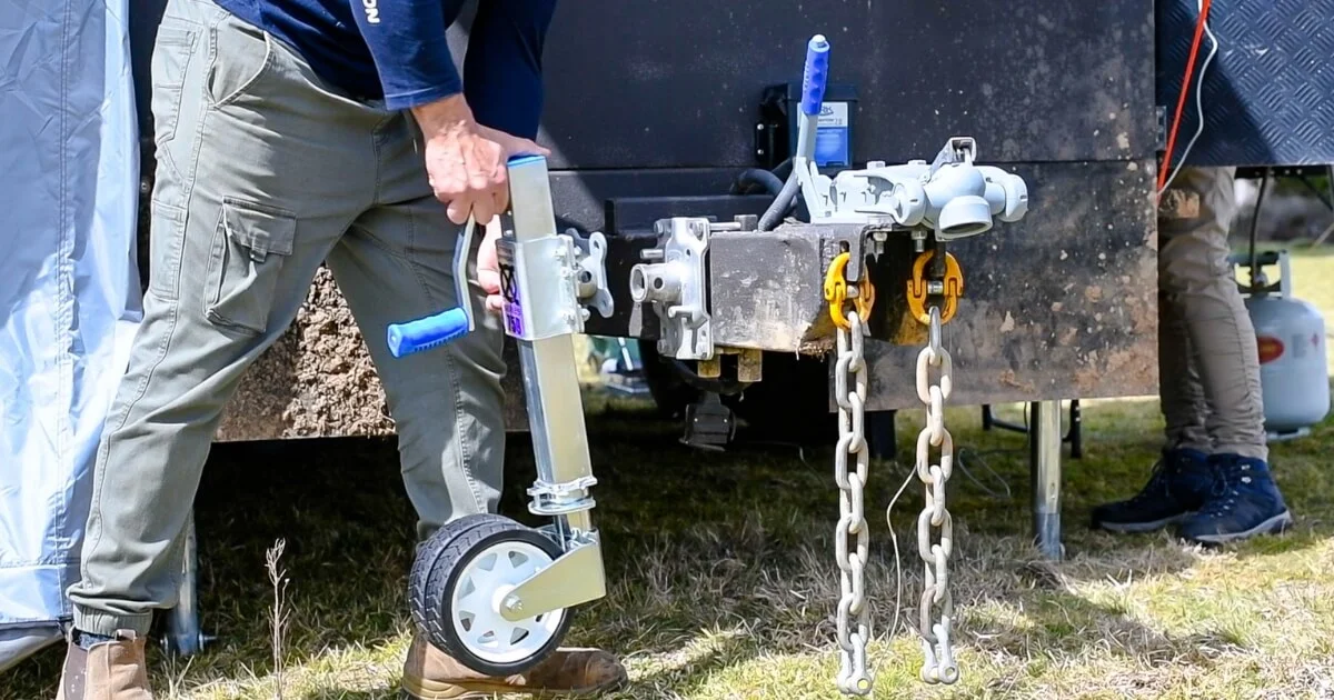 A clean jockey wheel being attached to a trailer