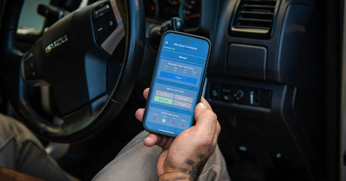 Looking at a phone screen inside a vehicle